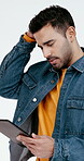 Stress, tablet and man in studio with worry for scam notification, fintech loss and bad news. Confused, white background and person on tech with error, mistake and crisis for digital gambling app
