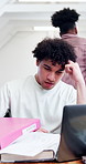 Stress, student and chaos in college with laptop, distraction and rushing to complete assignment. Timelapse, man and multitasking in class with books, exam preparation and academic burnout for study
