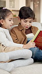 Love, reading or children on couch with book, sibling storytelling or bonding in weekend hobby. Childcare, fantasy or kids in home with story, quality time or family connection in literature activity