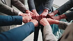 Business people, unity and fist bump in meeting, teamwork and solidarity for legal services or case. Corporate, lawyers and collaboration with colleagues, above and partnership with group in law firm
