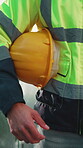 Construction, hands or hardhat on site for safety, protection gear or equipment in building project. PPE, man or engineer with risk control, hazard prevention or compliance in industrial industry.