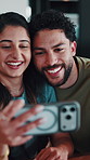 Happy, couple and video call in home with phone, connection and bonding together with conversation. Married people, smile and online meeting in apartment with tech, virtual contact and communication.