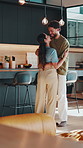 Dancing, happy and couple in home with kiss, romantic moment and bonding with favorite song. Marriage, house and man with woman with affection, moving and music for relationship, love and connection