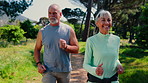 Walking, happy and senior couple in park for wellness, exercise and active for healthy lifestyle. Marriage, retirement and woman with man on nature path for fresh air, cardio workout and mobility