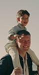 Shoulder, ride and dad with child, face and spinning with son on weekend and dancing together. Happy family, man and playing with kid on break, portrait or connection with father on rooftop at home