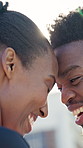 Outdoor, couple and laugh with forehead touch, love and bonding with partner and happiness on break. Black people, smile and connection with spouse on weekend, low angle and relationship commitment