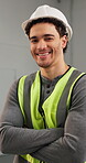 Construction, face and man with arms crossed, site manager and pride as compliance surveyor. Laugh, confidence and happy supervisor with hardhat, safety officer and about us in building development.