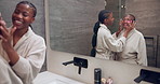 Senior, mom and adult daughter with eye patches in bathroom mirror for skincare routine together. Elderly, mother and black woman with smile or reflection for cosmetics or facial treatment in house