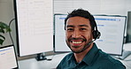 Computer screen, smile and man in call center for tech support, virtual assistance and IT help desk. Face, headset and happy person in office with desktop, software troubleshooting or laughing