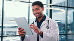 Doctor, man and tablet in hospital with smile for medical advice, research and telehealth app. Asian person, technology and internet connection at clinic with results, scroll and planning online