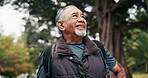 Senior, happy man and thinking in forest for hiking adventure, scenic break and explore nature. Fresh air, pensioner and trekking in woods with reflection, sightseeing and healthy aging with backpack