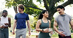 Park, fitness and couple of friends with walk, post exercise conversation and wellness support. Active relationship, happy people and stroll with water outdoor for morning cardio, bonding and talking