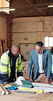 People, tablet and blueprint in workshop for carpentry, research and structure for manufacturing. Carpenter, team and digital in factory with floor plan, illustration and briefing for joinery project