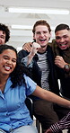 College students, face and laughing with fist pump, success and cheering with friends in classroom. Portrait, celebration and happy people on break, education or scholarship for studies in university