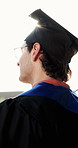 College, graduation or man outdoor with thinking, daydream or reflection on academic milestone. University, back or student with inspiration, success perspective or goal mindset at farewell ceremony 