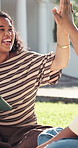 College students, high five and happy women with tablet, outdoor or celebration for academic growth. University campus, education and excited for achievement with friends, laugh and people with tech