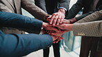 Business people, unity and hand stack in meeting, teamwork and solidarity for legal service or case. Corporate, lawyers and collaboration with colleagues, above and partnership with group in law firm