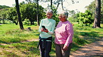 Fitness, phone and happy with old women in park for runner route, miles tracking and health. Wellness app, training guide and smile with senior friends outdoor for support and exercise progress