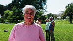 Face, laugh and old woman in park with fitness class, active aging and pride in workout hobby. Happy, portrait or senior person with confidence, training group or positive attitude in outdoor session