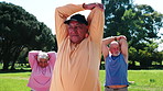 Fitness, coach or elderly people in park with stretching, active or workout group in wellness hobby. Exercise, instructor or senior man with mobility, training together or keeping fit in retirement.