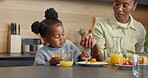 Pancake, breakfast and relax with black child in home for health, connection and weekend break. Brunch, wellness and nutrition with family eating in dining room of house for food, bonding and syrup