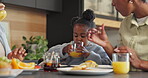 Juice, breakfast and relax with black child in home for health, connection and weekend break. Brunch, wellness and nutrition with family eating in dining room of house for food, bonding and meal