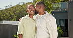 Romance, smile and couple with cheek kiss, partner comfort and bonding together in backyard. Tender, hug and black people outdoor with forehead touch, happy moment and loving relationship at home.