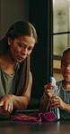 Mother, child and cleaning home, spray and wipe table for learning hygiene for help with smile. Chores, girl and parent with cloth for teaching housework, pointing or talking for bacteria safety
