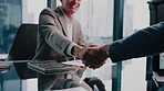 Boardroom, business people and handshake for meeting, finance deal or investment partnership. Corporate, tech and men shaking hands for financial agreement, negotiation and merger with consultant
