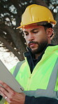 Builder, online and man with tablet, outdoor and plan for renovation project with digital blueprint. Construction worker, scroll and happy person with tech, low angle and building schedule on web