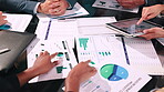Meeting, documents and hands with business people in office for strategy, insurance sales and team. Track claims status, customer risk profile and geographic trend chart with employees and paperwork