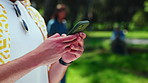 Hands, person and student with mobile outdoor for education schedule, course info or text message. Phone, college an man at campus with app for online portal, academic communication and typing
