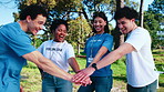People, hand stack and park for volunteering, teamwork and event success for community outreach. Smile, friends and applause in nature for ngo donation, poverty alleviation and charity collaboration