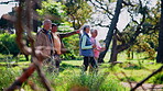 Talking, happy and old people outdoor for walking, active aging or group workout for senior wellness. Hike, nature or elderly friends with exercise, cardio or team fitness for retirement activity.