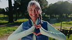 Face, fitness or senior happy woman with heart hands in nature for outdoor workout or cardiac health. Active, portrait or elderly female person with smile, shape or emoji for love or wellness in park