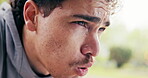 Fitness, break and man in park with sweating, cardio fatigue and rest with outdoor practice. Space, dedication and athlete in nature with breathing, training pause and exercise burnout with recovery.