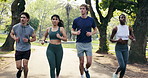 Fitness, serious and friends in park with running, cardio and exercise together in physical activity. Practice, collaboration and people with jog, stamina training or team wellness in outdoor workout