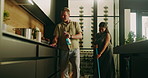 Cleaning, dancing and happy couple with vibe in kitchen for fun chores, energy or teamwork together. Man, woman or moving with smile, music or hygiene for dirt, bacteria or germ removal in house