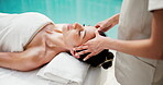 Spa, luxury and head massage for woman on holiday, zen and stress relief on bed and hospitality. Resort, break and mature person with masseuse, sleeping and pamper on vacation or holistic wellness