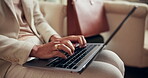 Laptop, hands and travel with business person in hotel for conference itinerary, research and report. Corporate retreat, vip event and tradeshow hospitality with employee in lodge for online update