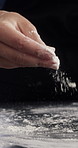 Person, hands and sprinkle with flour for culinary art, hospitality or meal prep for pizza. Pastry chef, food or getting ready with texture, powder or seasoning dust for catering, recipe or cuisine