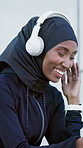 Smile, black woman and headphones in city for fitness, streaming and podcast for exercise break. Happy, muslim person or relax outdoor for fresh air, listen to music and motivation audio for training