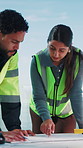 People, team and blueprint on site for planning, renovation idea and problem solving in meeting. Man, woman pointing and outdoor with floorplan for discussion, engineer collaboration and instruction