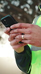 Hands, phone and civil engineer outdoor as construction worker for communication, flare or contact. Person, technology and networking for contractor, project management and mobile app with internet