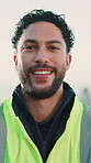 Construction, face and happy man outdoor with pride, contractor and ambition in building renovation. Portrait, smile and engineer with about us, site developer and confidence in remodeling industry.