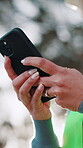 Texting, online and hands with phone, outdoor and communication with contact on social media or chat. Typing, message and person with mobile, low angle and network with internet connection and flare