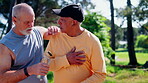 Fitness, team or old man with chest pain, water support or cardiac concern in park exercise. Wellness, help or elderly people with bottle, breathing difficulty or heart condition in workout activity.