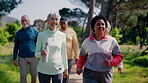 Coach, happy and old people in nature for walk, active aging or group workout for wellness. Personal trainer, outdoor or elderly friends with exercise, cardio or team fitness for retirement activity.