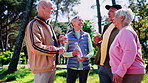 Fitness, old people and couple of friends at park on break with water bottle, health or laughing. Active retirement, happy group and conversation outdoor, funny joke and wellness with hydration