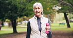 Dumbbells, workout and old woman in park with walk, cardio exercise or wellness for health longevity. Senior person, weights and training outdoor with aerobics movement, coordination and fitness.
